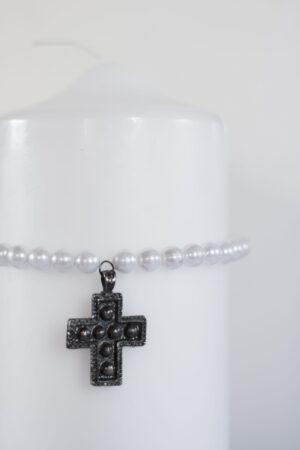 Pärlband runt ljus m. kors